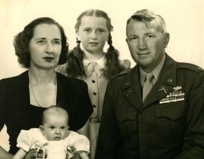 Ruth Clarke Hampton holding baby Myrna, Jacqueline, and Lt. Col. Henry J. Hampton, 1947